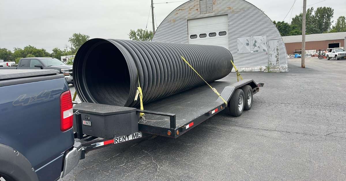 a large pipe on a flatbed