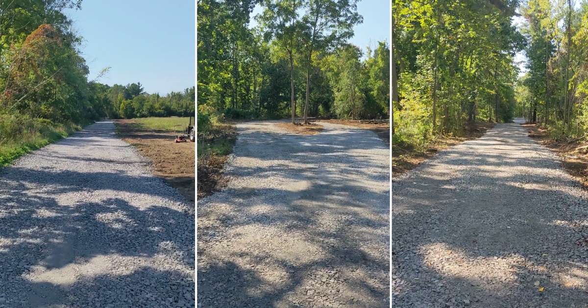 gravel driveway going through woods